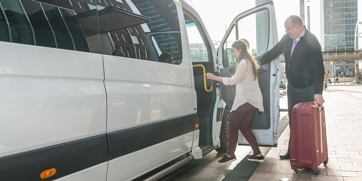 passengers boarding Kansas City bus rentals