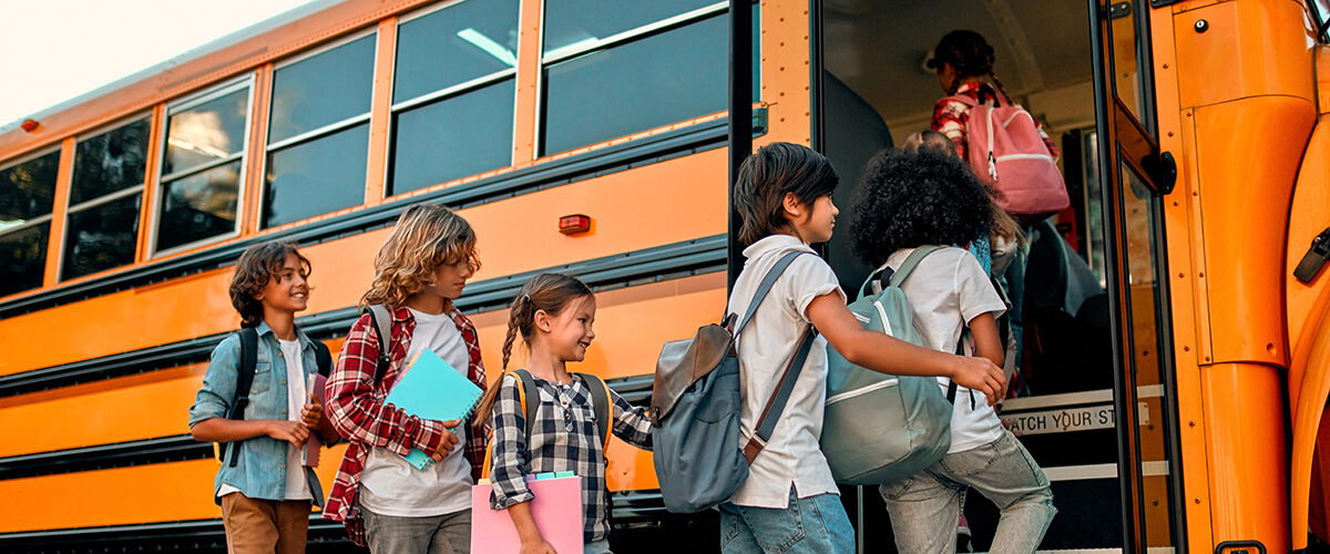 students boarding new school bus in dallas texas
