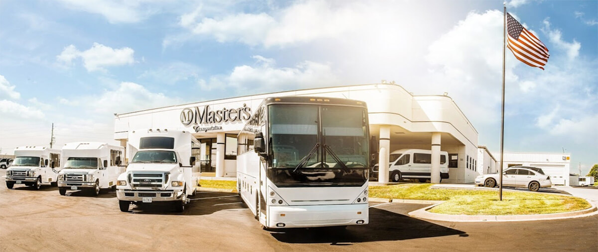 used buses parked outside masters transportation