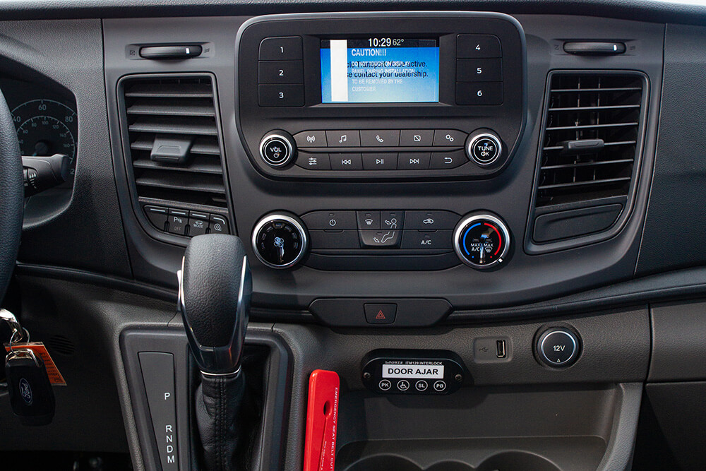 modern features stereo display inside 15 passenger van