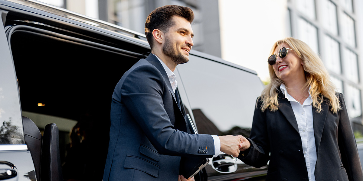 Driver delivers VIP to corporate event in Los Angeles, CA using luxury van.
