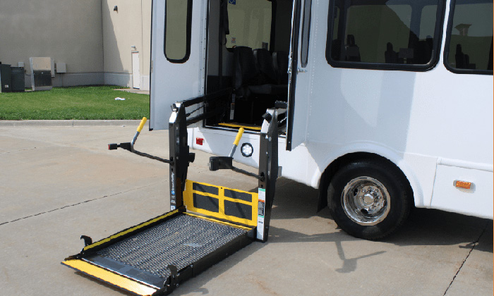 ADA bus with extended wheelchair lift